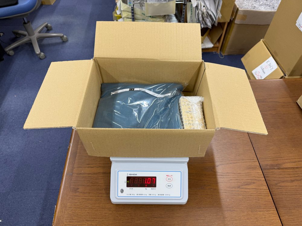 Open shipping box containing craft supplies for Australia, New South Wales